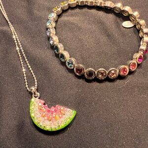 Cookie Lee- watermelon necklace and rainbow colored bracelet